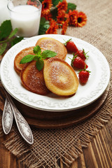 Homemade pancake with sugar powder