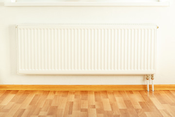 White radiator in apartment