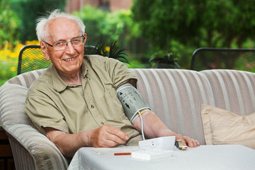 Elderly person with Sphygmomanometer