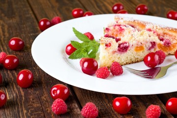 Fresh fruit pie on white plate