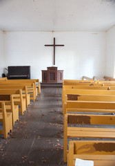 White church interior with pews