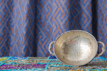 Moroccan metal bowl placed on a table