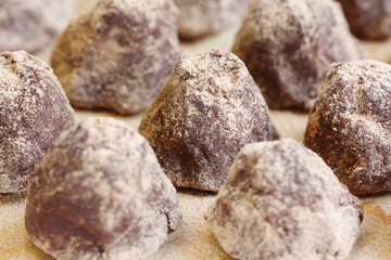 row of delicious confectionery - chocolate truffle with copy space
