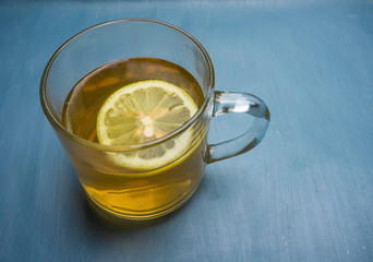 hot tea with fresh lemon to soothe a sore throat or cough
