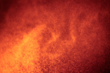 abstract dark bokhe lights background , red ,black and subtle gold. defocused background