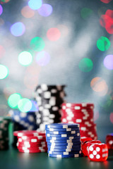 Chips for poker on shiny background
