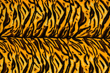 Texture fabric of tiger for background