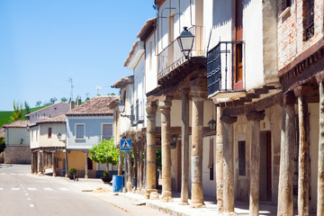 Old houses at picturesque street of Ampudia