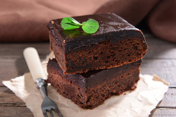 Delicious chocolate cakes on table close-up