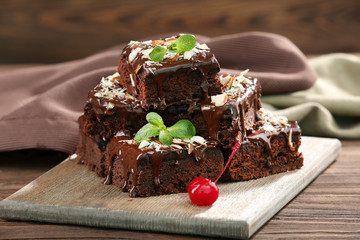 Delicious chocolate cakes on table close-up