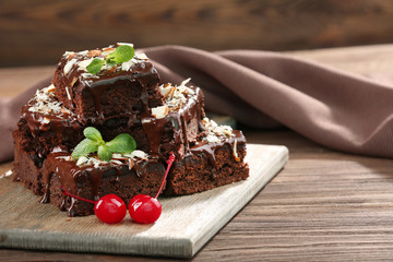 Delicious chocolate cakes on table close-up