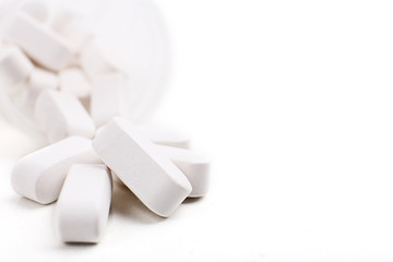Fototapeta na wymiar Pile of pills isolated on white