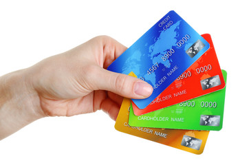 Hand holding credit cards, isolated on white