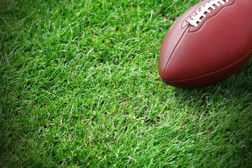 Rugby ball on green field