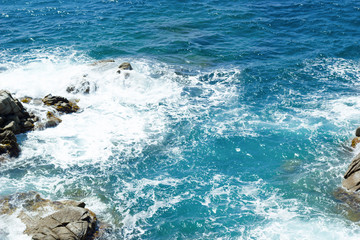 Sea rocks and waves