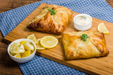 Baked wrapped salmon dinner with lemon