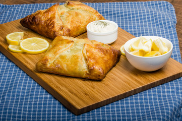 Baked wrapped salmon dinner with lemon