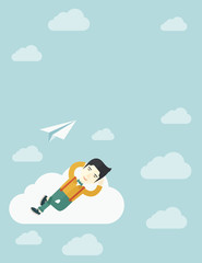 Asian man lying on a cloud with paper plane.