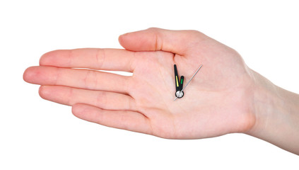 Hand holding clock arrows isolated on white