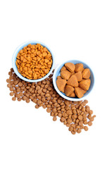 Blue ceramic dogs bowls. Dry dog food in bowl isolated on white background. Dry dog food isolated on white background