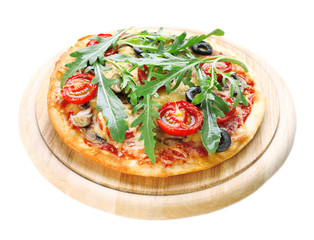 Tasty pizza with vegetables and arugula on cutting board isolated on white