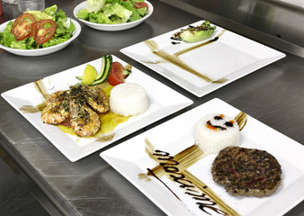 italian food: shrimps, vegetables and burger