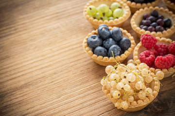 Assorted summer berries in tartlet of dough