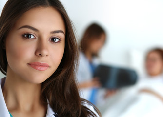 Beautiful female medicine doctor looking in camera