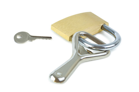 Key and a bottle opener locked to a padlock. Concept photo of drinking problem and alcoholism.