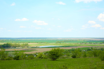 Fototapeta premium Beautiful view of countryside over blue sky background