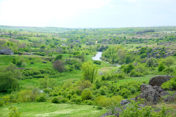 Beautiful view of countryside over blue sky background