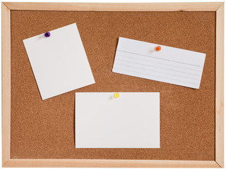 Blank paper pin up on cork board isolated on white background
