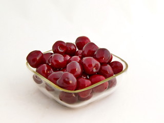 Some ripe cherry fruits in the basket