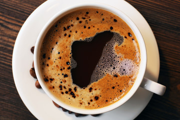 Cup of coffee on table close up
