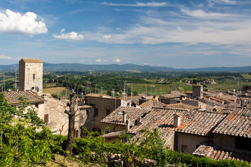 Fototapeta na wymiar cloud over San Gimignano towers, Tuscany, Italy 