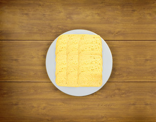 cut cheese on a plate