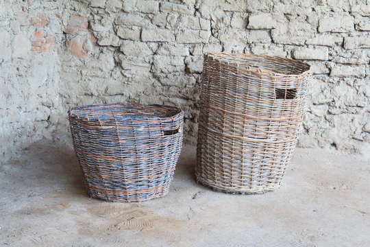 Two wattled baskets of broze century