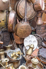 brassware / Flea market stand with brass pans and brass pots