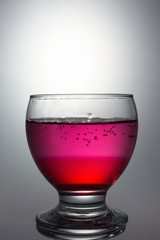 Mixed syrup and water in the transparent grass