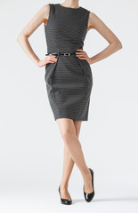 Unrecognizable young woman in a dress