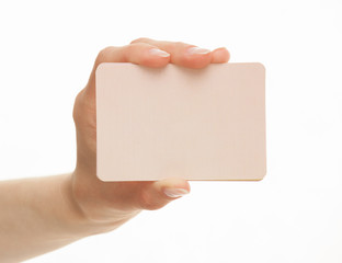 Obraz premium Female hand holding a paper card