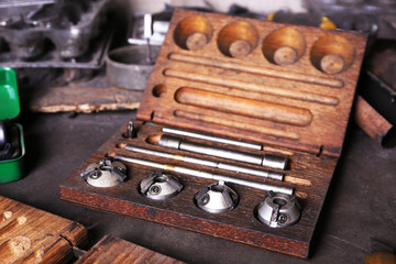 Different tools on workplace in garage