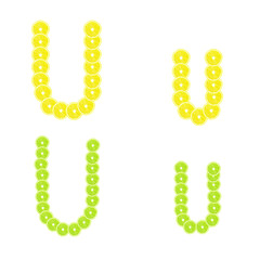 Letters stacked slices of lemon and lime to create inscriptions