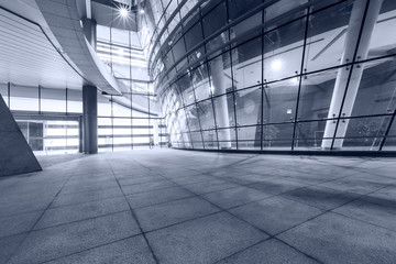 Empty walkway in front of the modern building