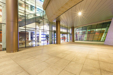 Empty walkway in front of the modern building