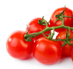 Group of cherry tomatoes isolated on white
