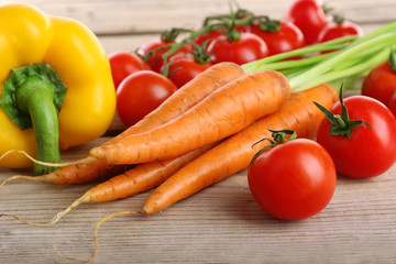 Fresh vegetables on wooden table, closeup