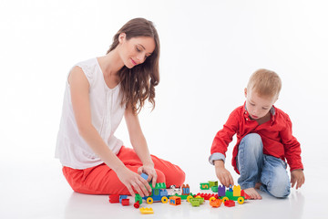 Naklejka premium Beautiful mother and her child are spending time together 