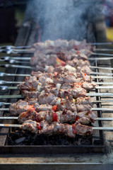 hot roasted shashlik on metal skewers