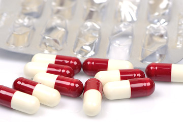 Pills. Red and White and blister pack, Isolated on White Backgro